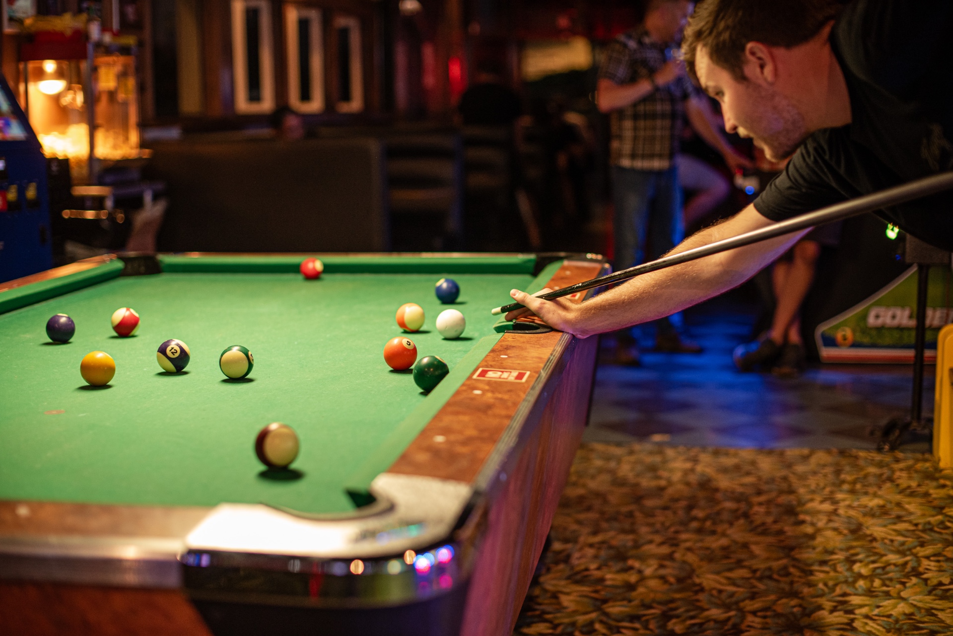 Pool table and pinball at Club Marina
